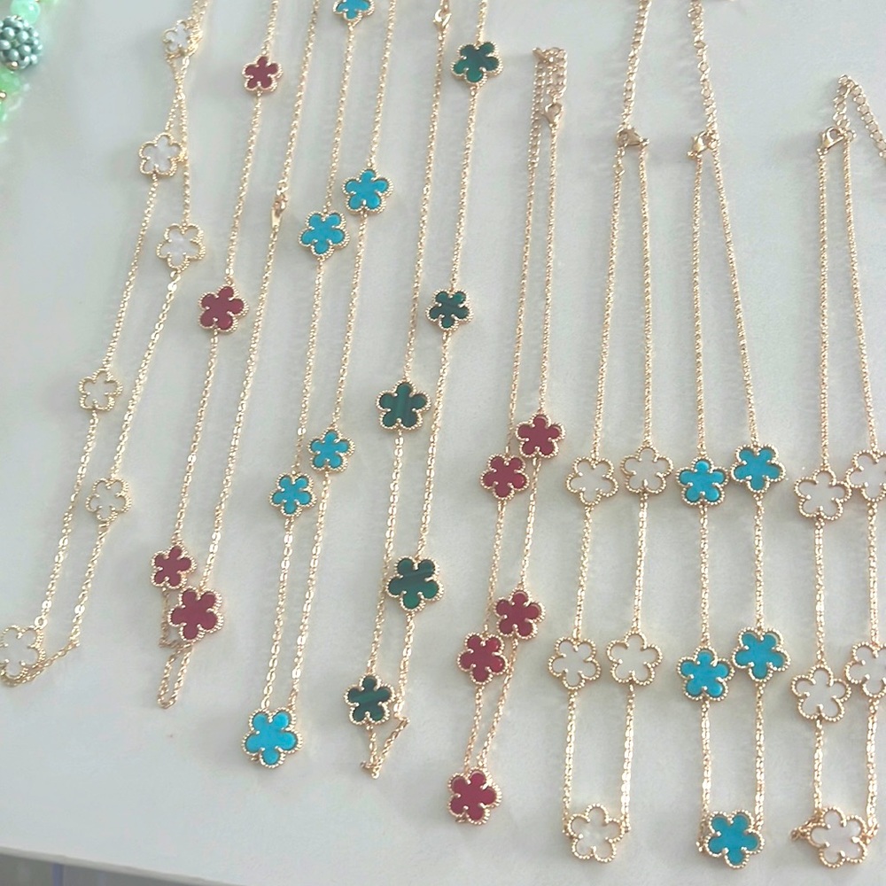 Latest Accessories necklaces, bracelets and  earrings. Enamel and gold shower.